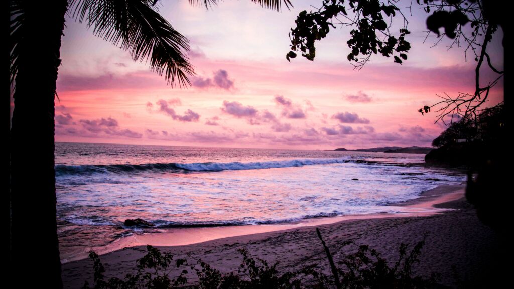 Ocean scene with a beautiful pink and purple sunset