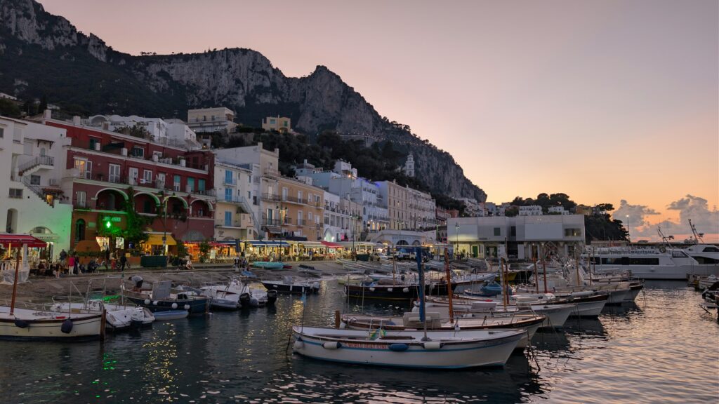 Having 14 days or more in Italy allows you to visit more remote places on a slower timeline. You can experience moments like this sunset over the harbor in Capri.