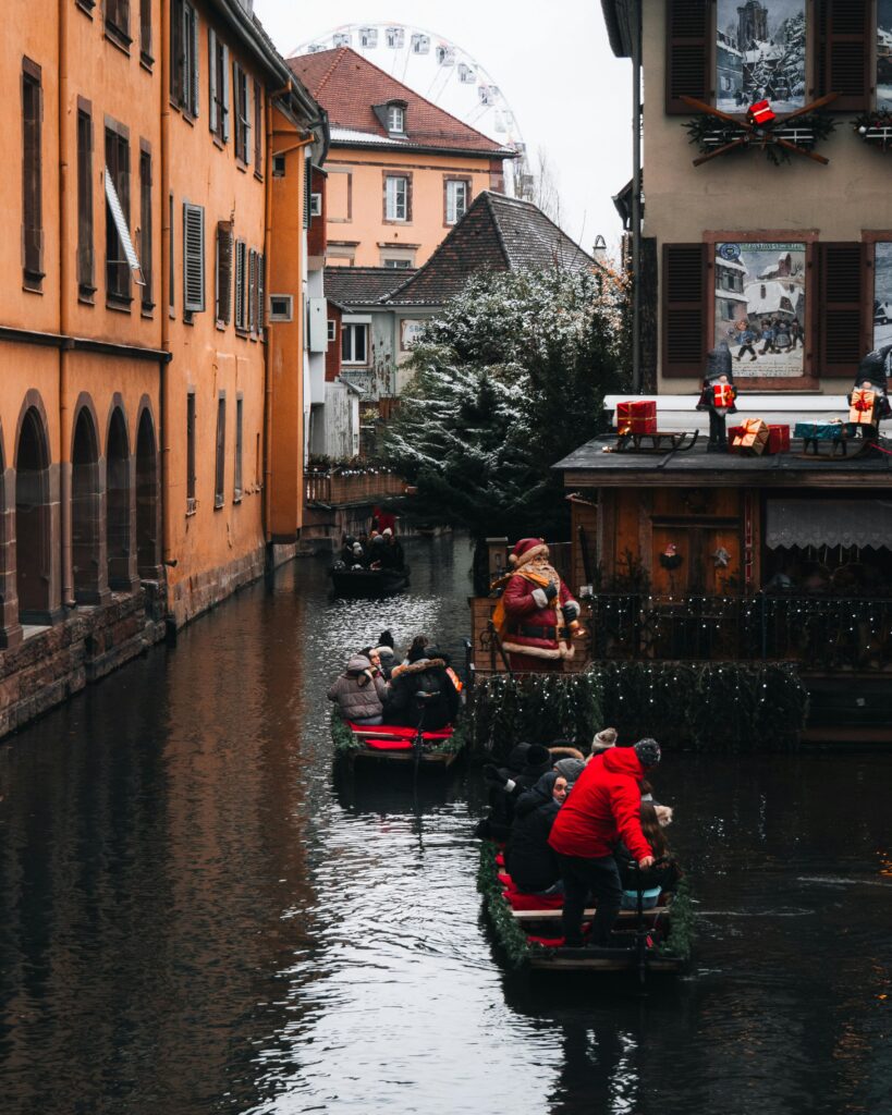 Touring the Colmar christmas markets and town by boat, a unique experience in France at Christmas.