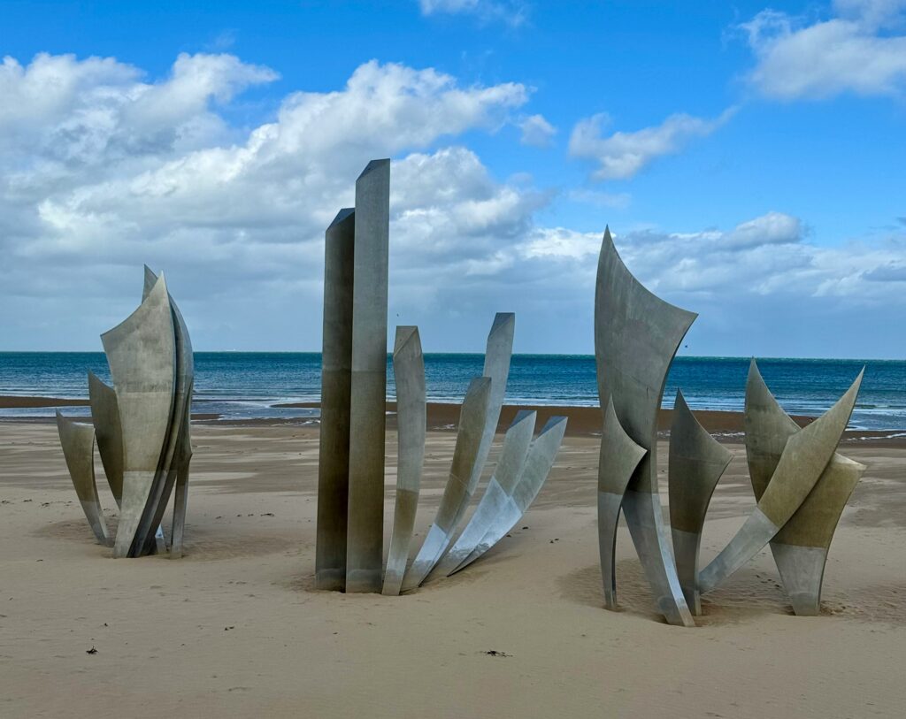 Les Braves Memorial on Omaha Beach in Normandy, one of the most meaningful places to visit in France for WWII history
