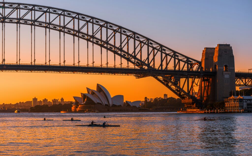 Sydney Harbour Bridge and Opera House at sunrise during summer, one of the best times to visit Australia