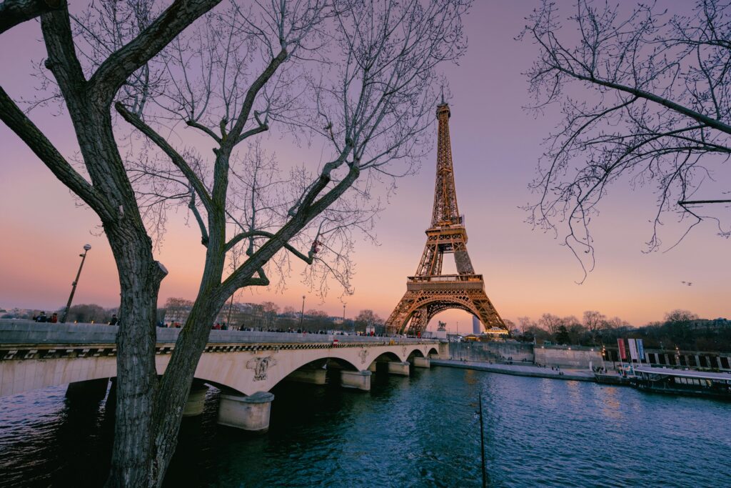 Eiffel Tower at sunset viewed from the Seine River in Paris, France