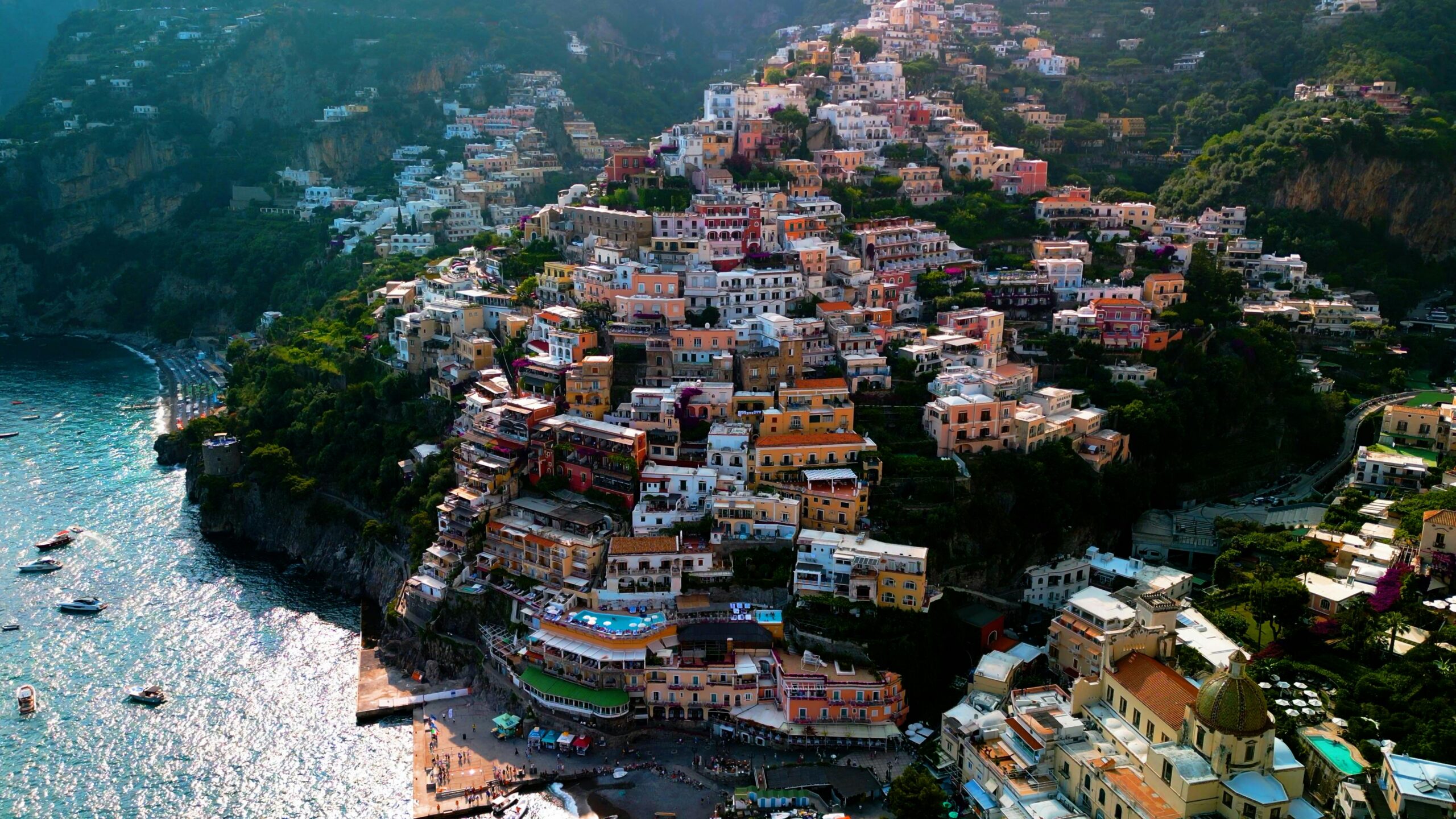 Amalfi Coast in Italy with colorful hillside village overlooking the sea in summer